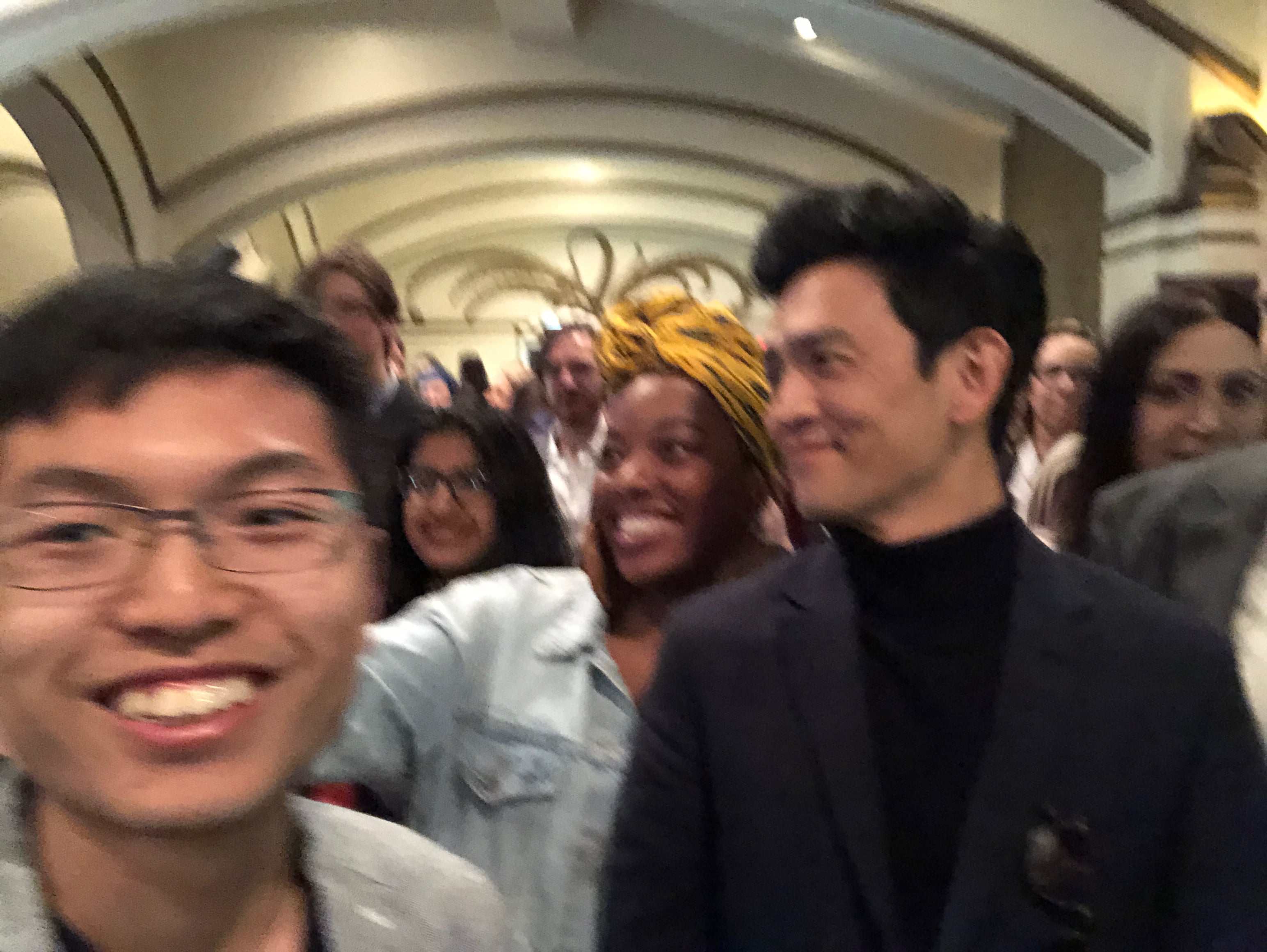 Me trying to get a photo with John Cho.